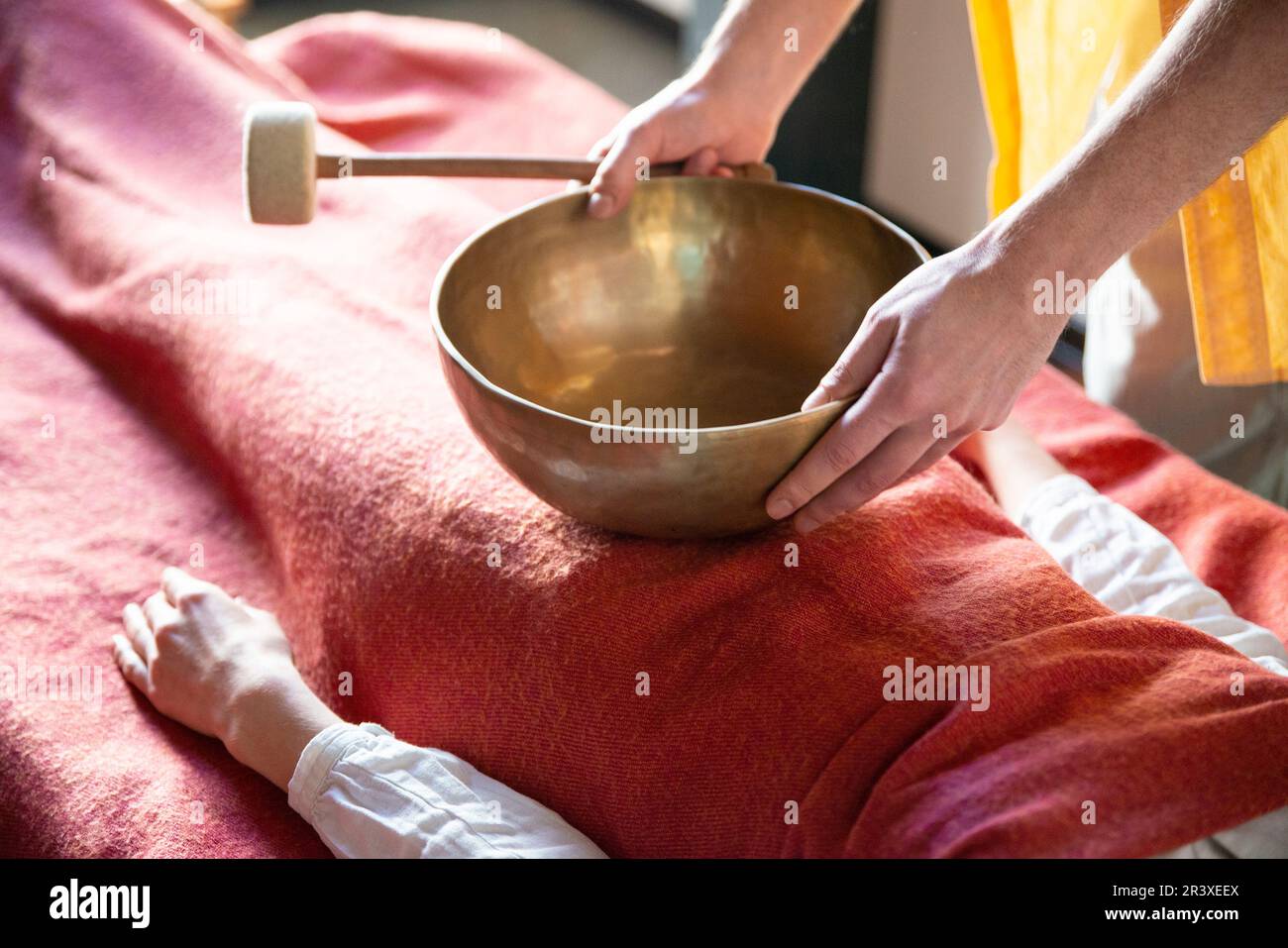 Tibetan singing bowls in sound therapy in spa center Stock Photo Alamy