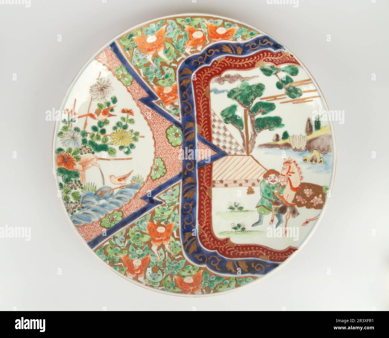 Antique 19th century Japanese Imari porcelain wall plate of unusual design Stock Photo