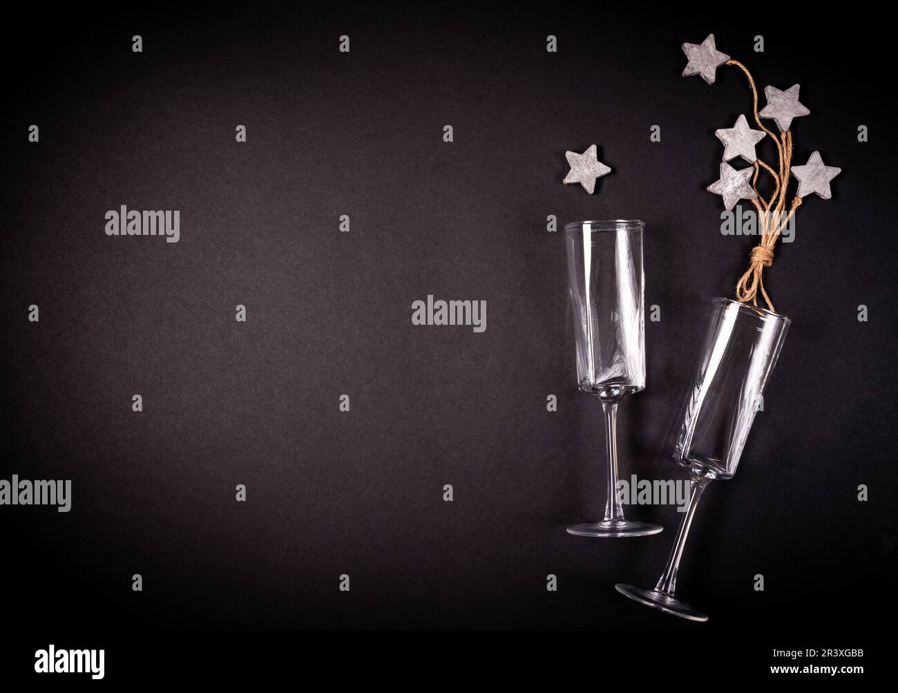 Two glasses with wooden tar decoraion with rope, flat lay, celebration ...