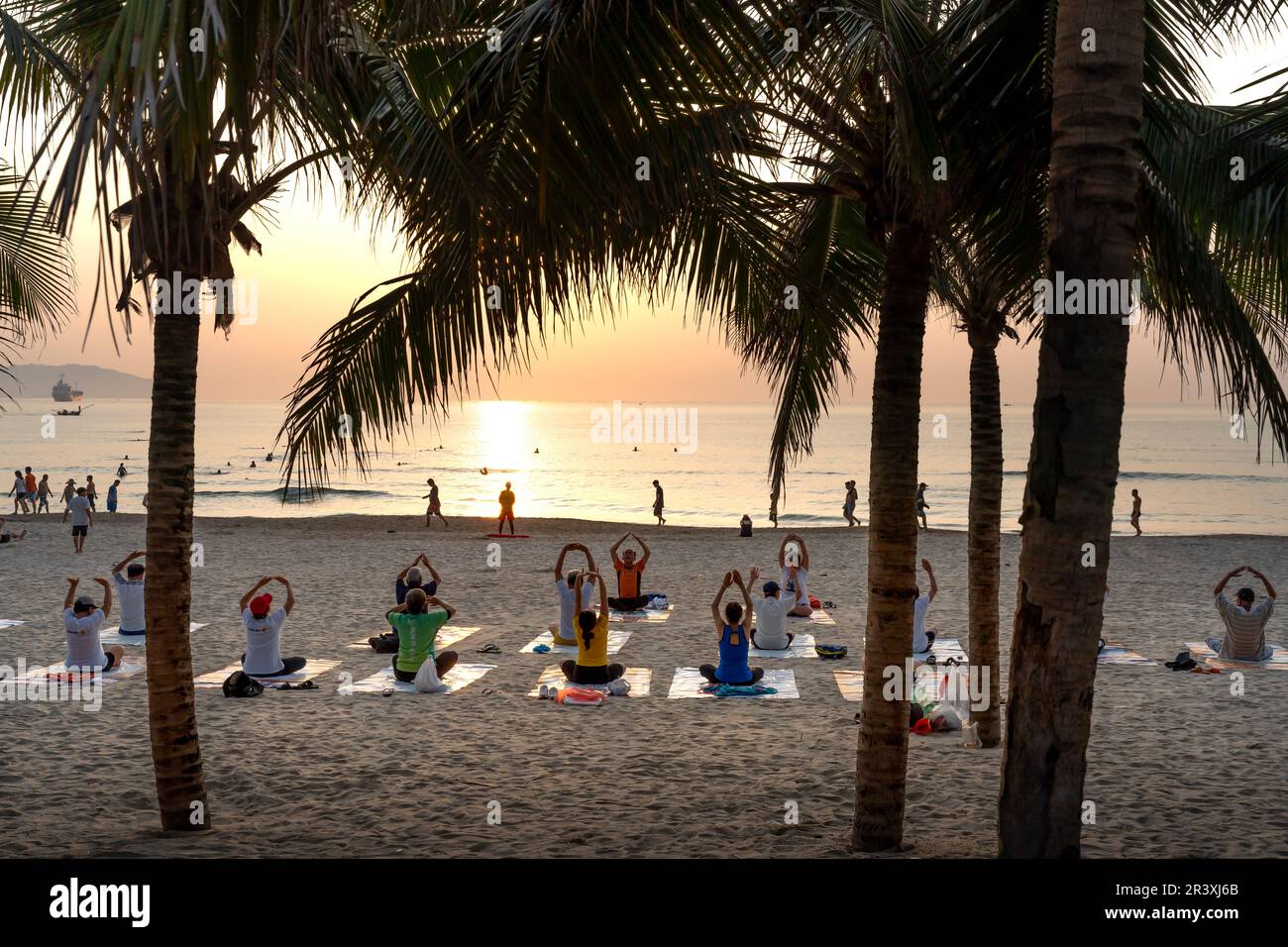 My Khe Beach, Da Nang City, Vietnam - May 17, 2023: Morning exercise on My Khe beach, Da Nang City, Vietnam Stock Photo