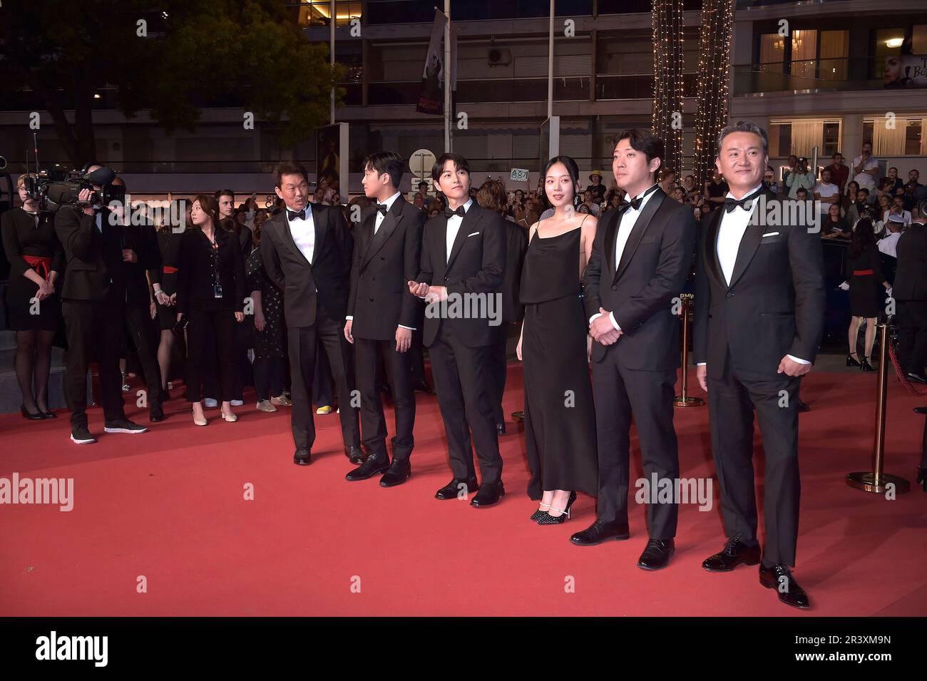 Cannes, France. 24th May, 2023.  Han Jae-duk, Xa Bin Hong, Joong Ki Song, Hyoung Seo Kim, Kim Chang-Hoon depart the 'Il Sol Dell'Avvenire (A Brighter Tomorrow)' red carpet during the 76th annual Cannes film festival at Palais des Festivals on May 24, 2023 in Cannes, France. Credit: dpa/Alamy Live News Stock Photo