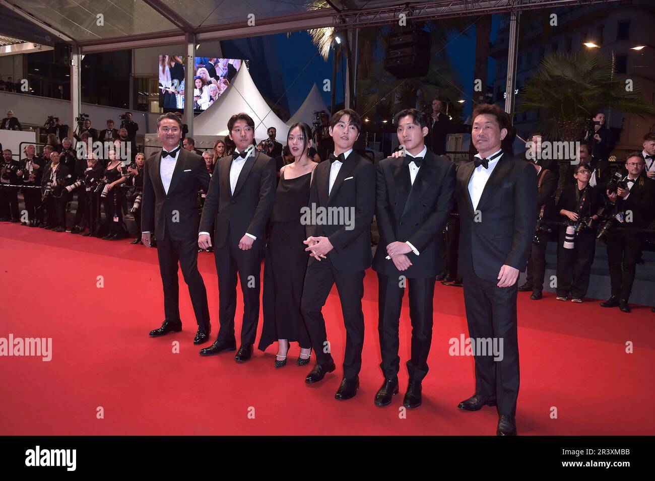 Cannes, France. 24th May, 2023.  Han Jae-duk, Xa Bin Hong, Joong Ki Song, Hyoung Seo Kim, Kim Chang-Hoon depart the 'Il Sol Dell'Avvenire (A Brighter Tomorrow)' red carpet during the 76th annual Cannes film festival at Palais des Festivals on May 24, 2023 in Cannes, France. Credit: dpa/Alamy Live News Stock Photo