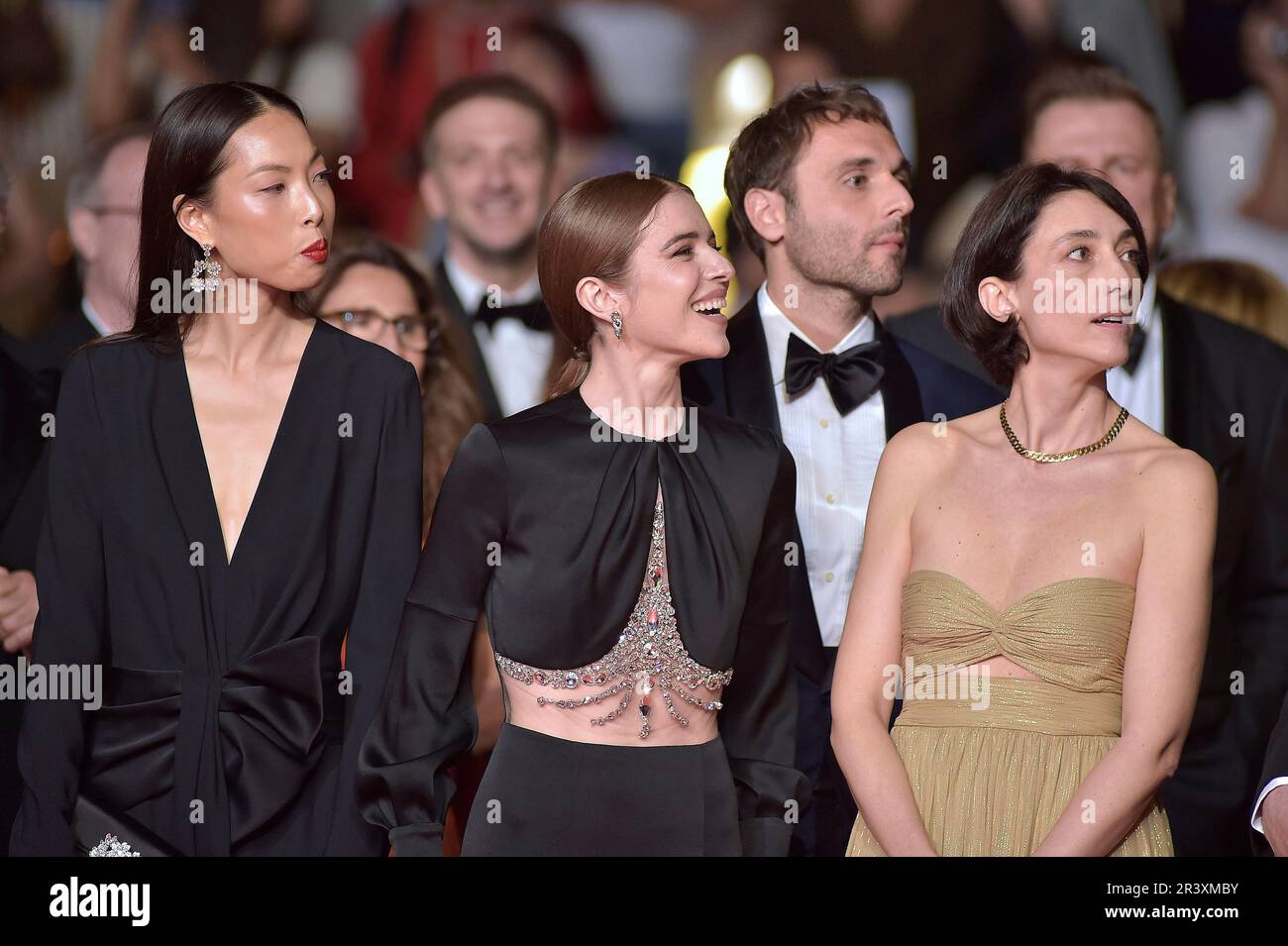 Cannes, France. 24th May, 2023.  Sun Hee You, Valentina Romani, Elena Lietti depart the 'Il Sol Dell'Avvenire (A Brighter Tomorrow)' red carpet during the 76th annual Cannes film festival at Palais des Festivals on May 24, 2023 in Cannes, France. Credit: dpa/Alamy Live News Stock Photo