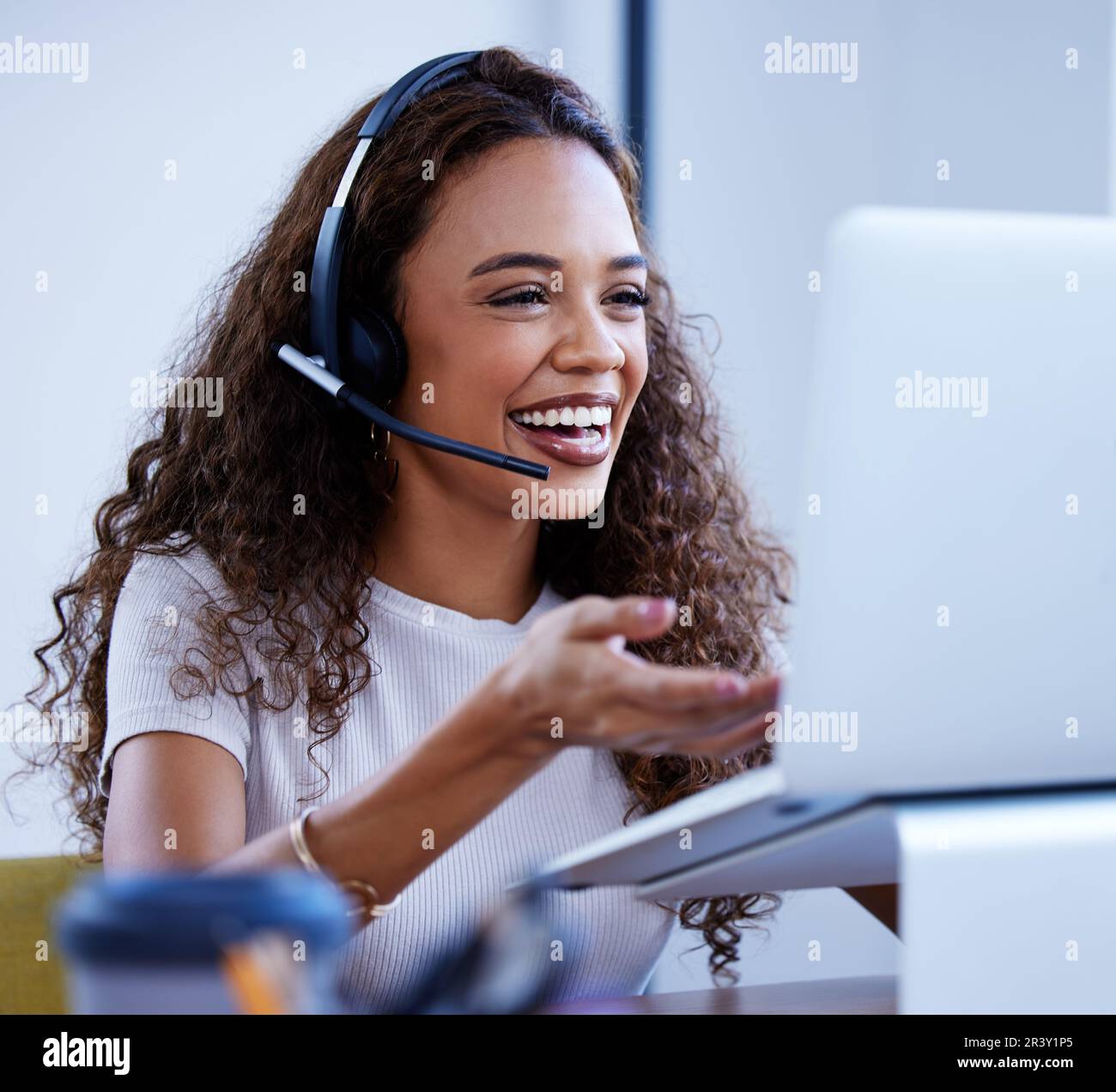 Call center, laptop and funny woman talking in office for customer service. Contact us, computer