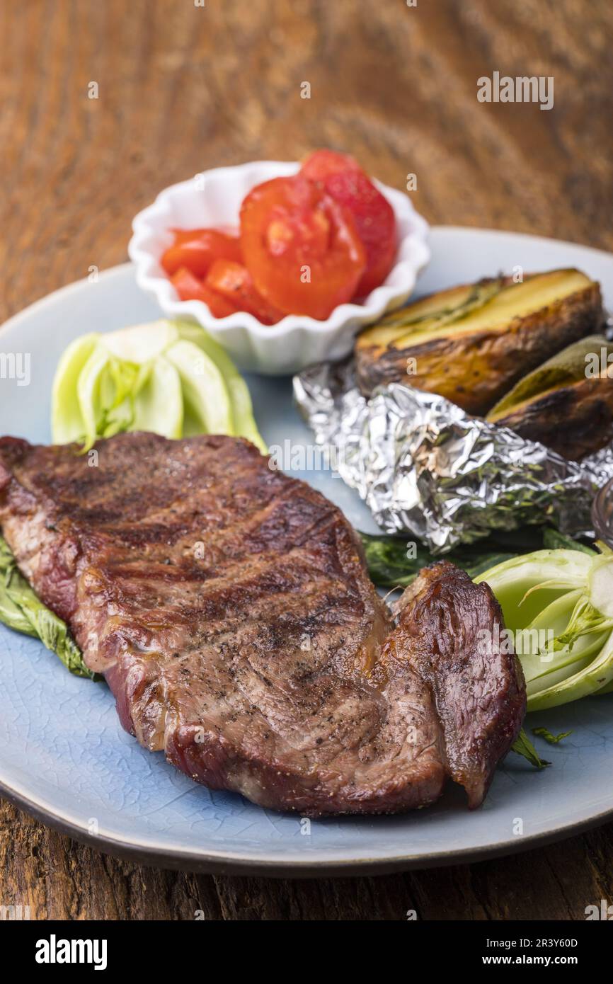 Grilled beef steak baked potato hi-res stock photography and images - Alamy