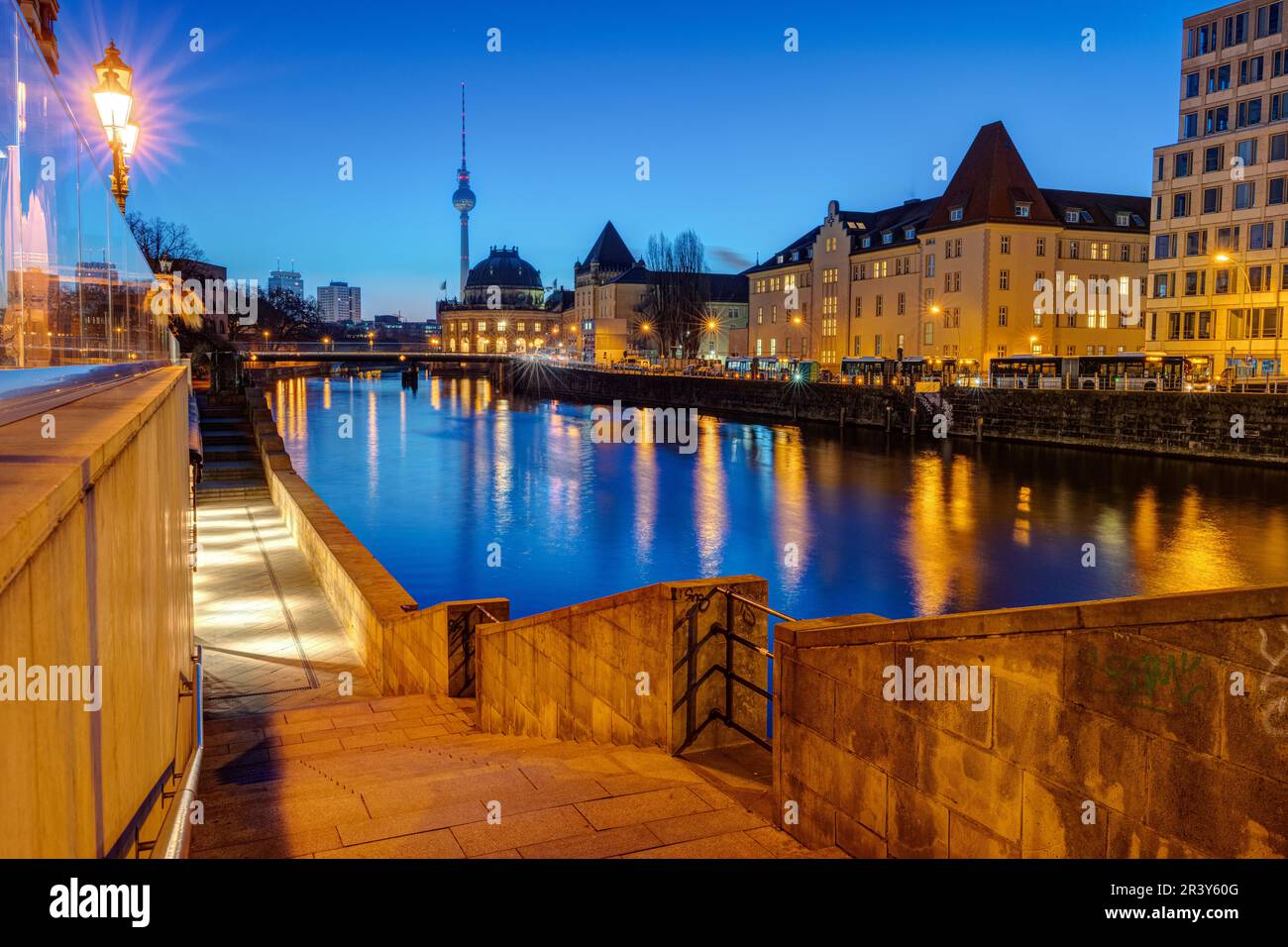 View along the banks of the river Spree in Berlin at twilight Stock Photo