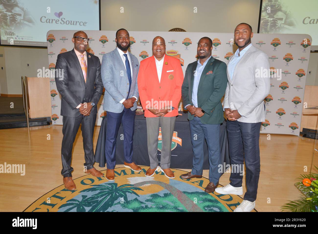 MIAMI GARDENS, FLORIDA - MAY 23: Dewey Norwood Jr., Senior Lead Diversity & Inclusion Consultant, Enterprise HBCU Strategy Wells Fargo Bank, T.C. Taylor, Head Coach, Jackson State University, Curtis E. Johnson, Jr., president of the Florida A&M University (FAMU) National Alumni Association, Willie Simmons, Head Coach Florida A&M University and Ashley D. Bell, Founder & CEO, Ready Life attend the Orange Blossom Classic 2023 Press Conference at Miami Gardens City Hall on May 23, 2023 in Miami Gardens, Florida. (Photo by JL/Sipa USA) Stock Photo