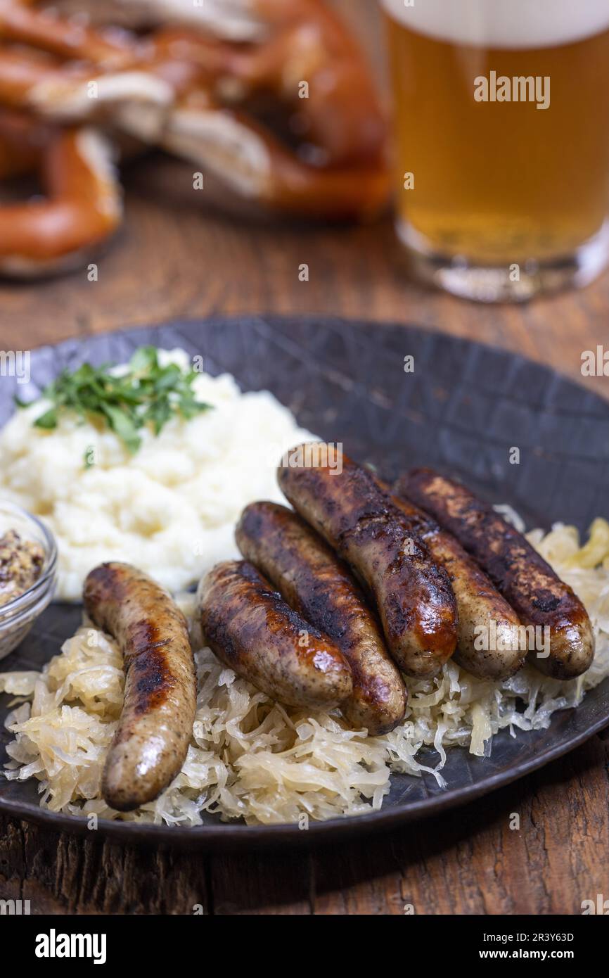 Franconian grilled sausages with sauerkraut Stock Photo