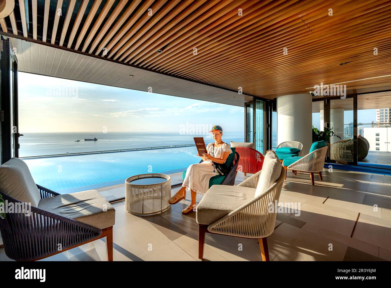 Radisson 5star hotel Da Nang, Vietnam May 16, 2023 A female tourist by the infinity pool