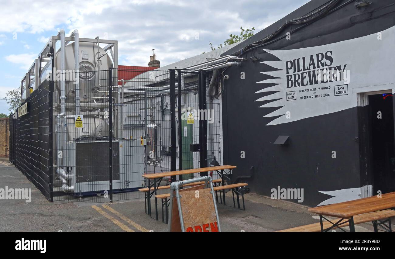 Exterior of Pillars Brewery at Unit 2 on the Ravenswood Industrial Estate in Walthamstow, East London, showing brewery signage, outdoor seating Stock Photo