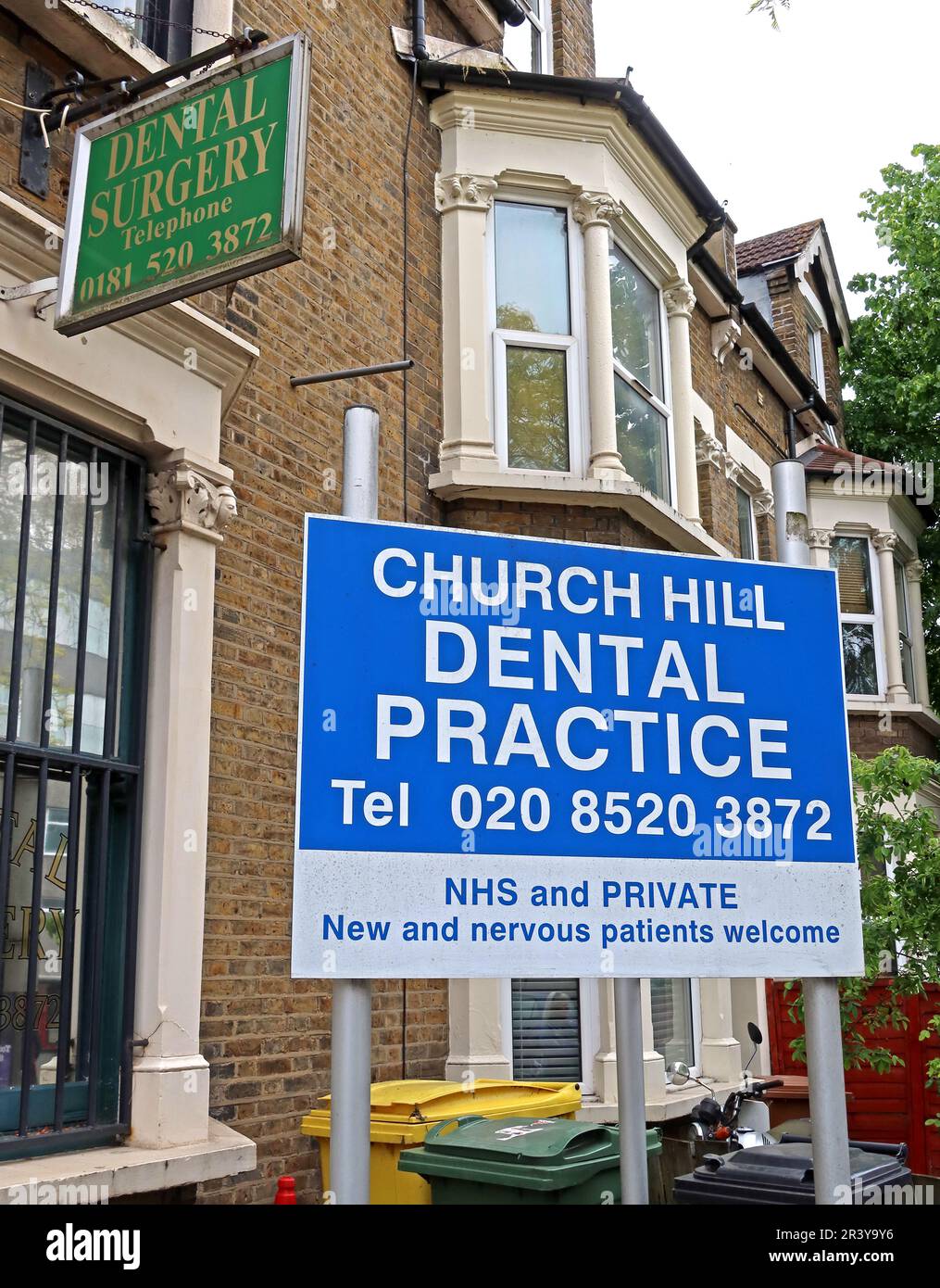 Sign for Church Hill Dental Practice in Walthamstow, East London, advertising NHS and private dental services and welcoming new and nervous patients Stock Photo