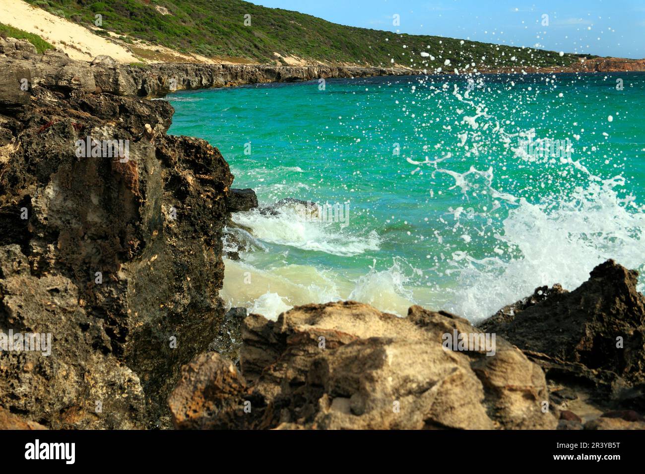 Breaking wave on rocky coastline, Cape Hamelin, Southwest Australia Stock Photo