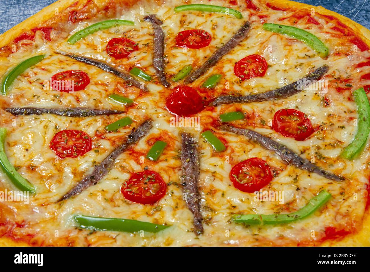 home-made pizza, wheel pattern, close up Stock Photo