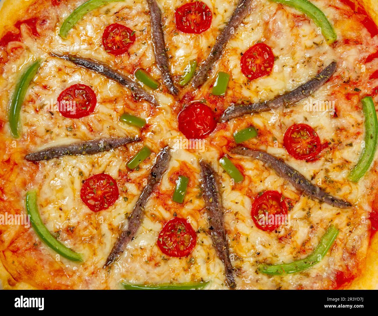 home-made pizza, wheel pattern, from above Stock Photo