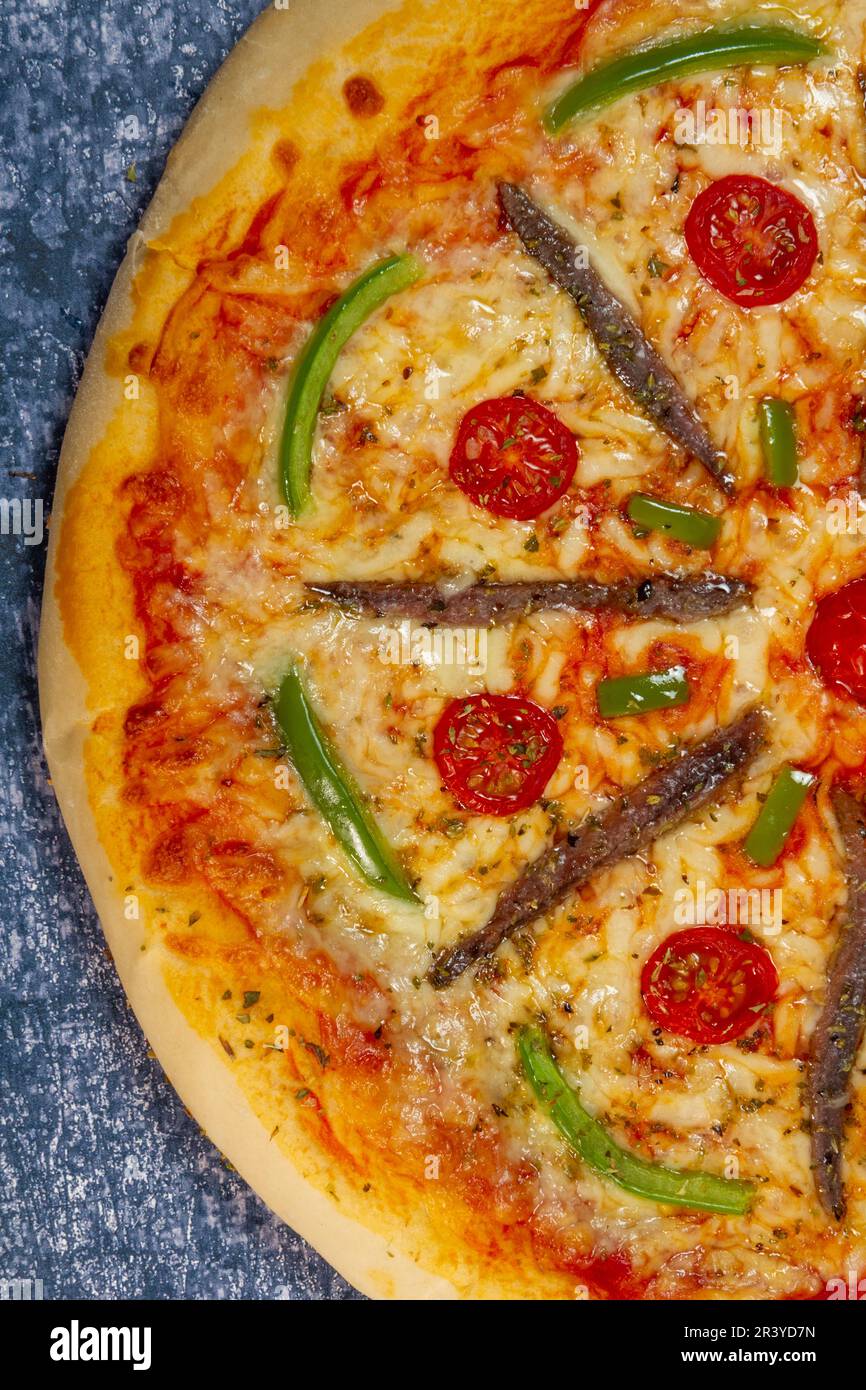home-made pizza, wheel pattern - half Stock Photo