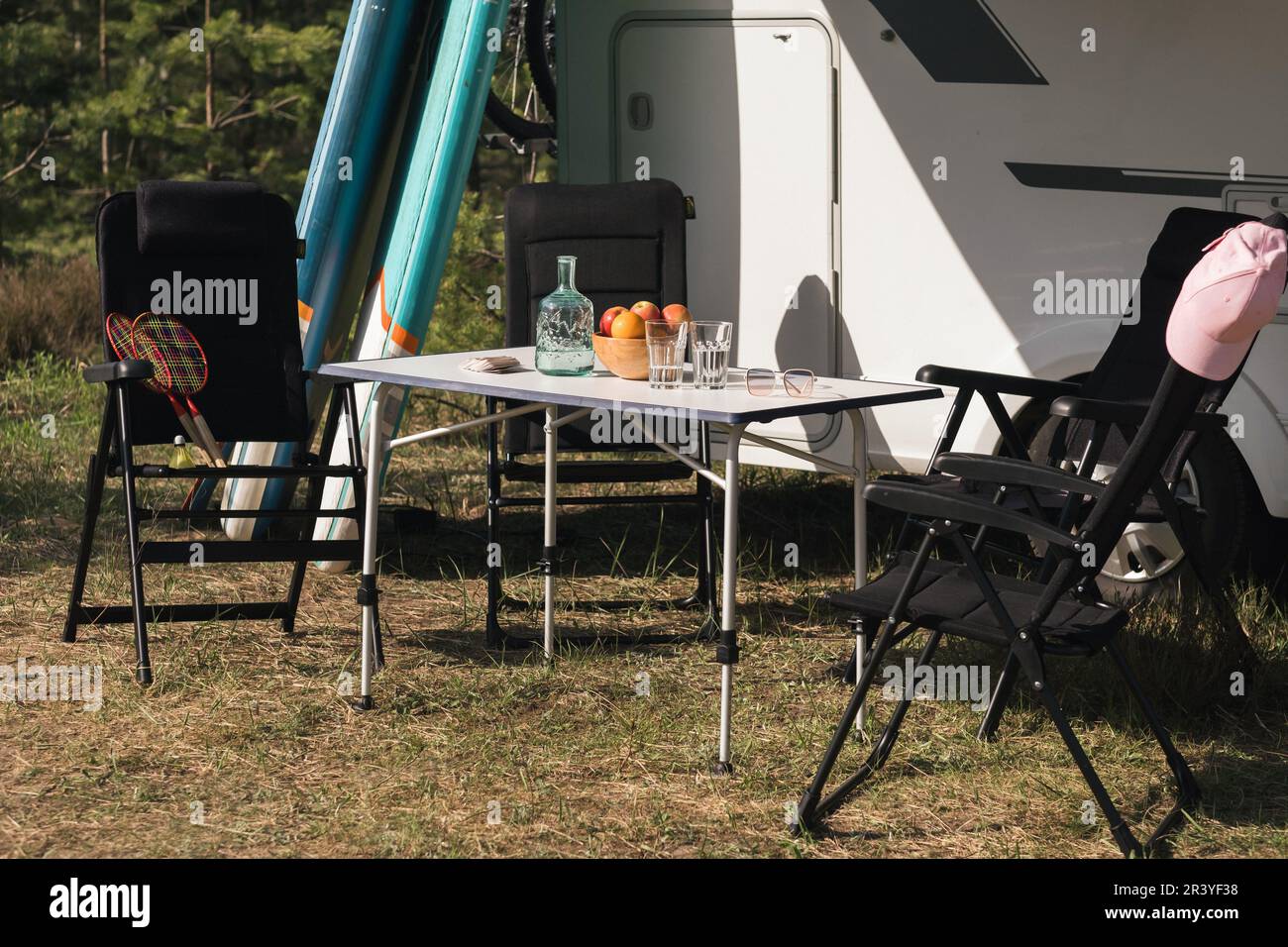 Outdoor Chairs and picnic table near the motorhome Stock Photo Alamy
