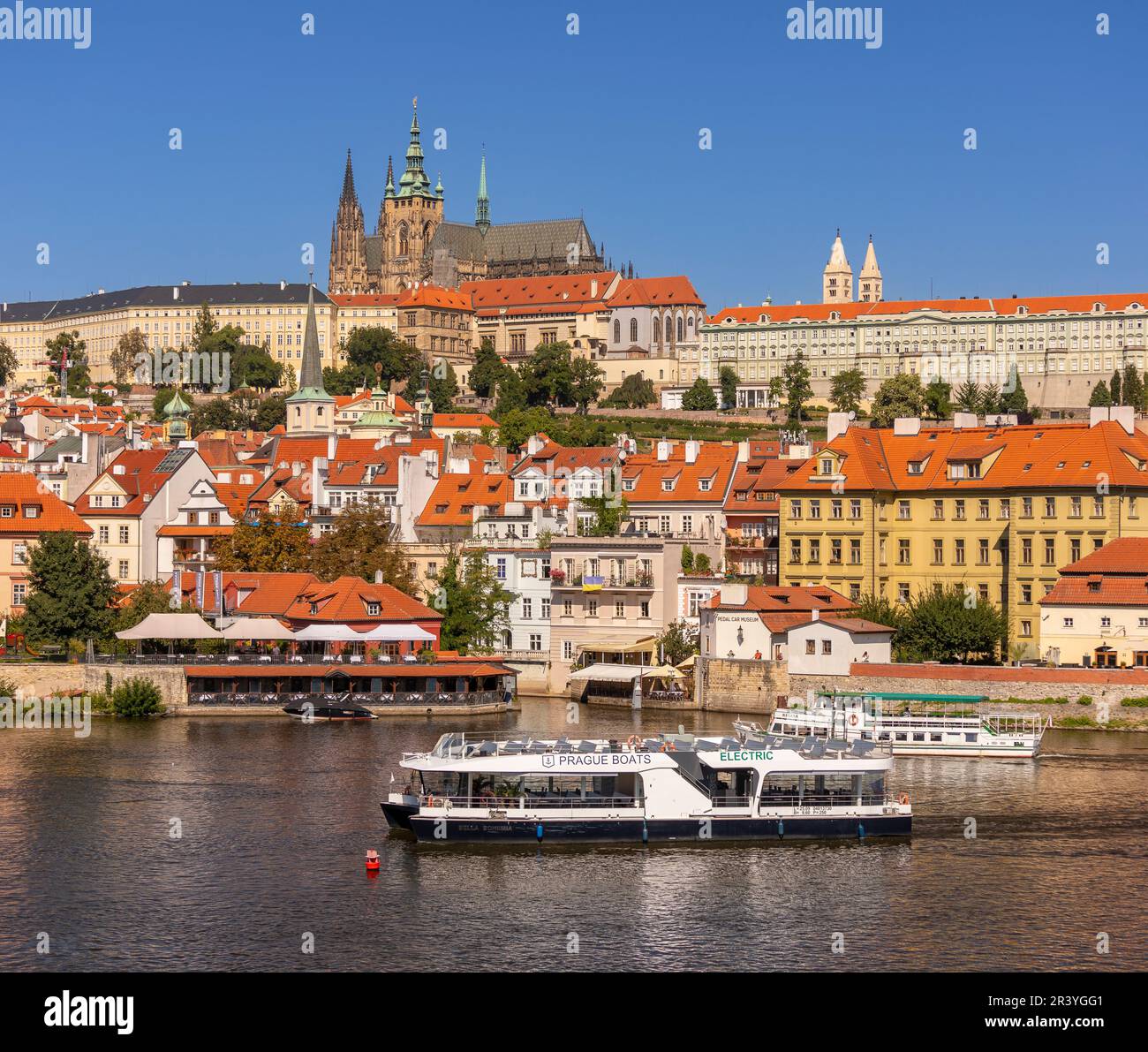 PRAGUE, CZECH REPUBLIC, EUROPE - Prague skyline with Prague Castle and St. Vitus Cathedral and Castle District, Hradcany, on RIver Vltava. Electric bo Stock Photo