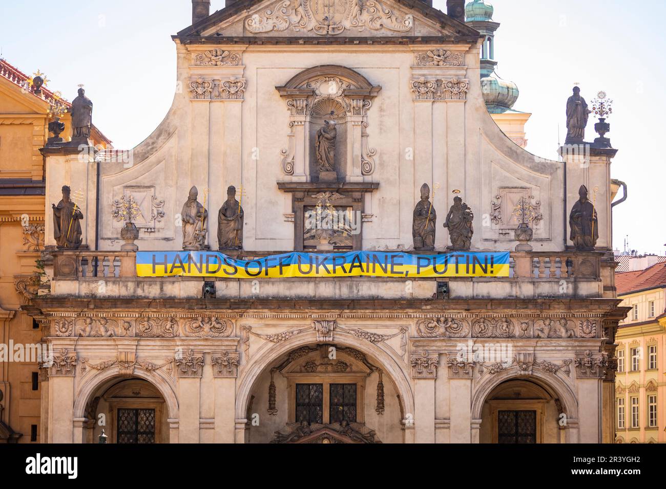 PRAGUE, CZECH REPUBLIC - Anti Putin banner supporting Ukraine, on building in Old Town. Hands off Ukraine Putin. Stock Photo