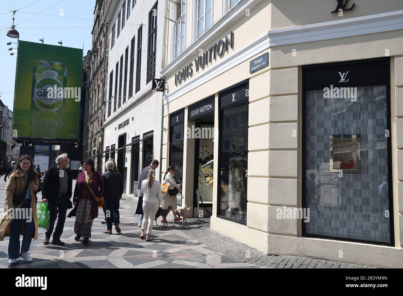 25 May 2023/ Consumers wait at Louis Vuitton store in danish capital ...