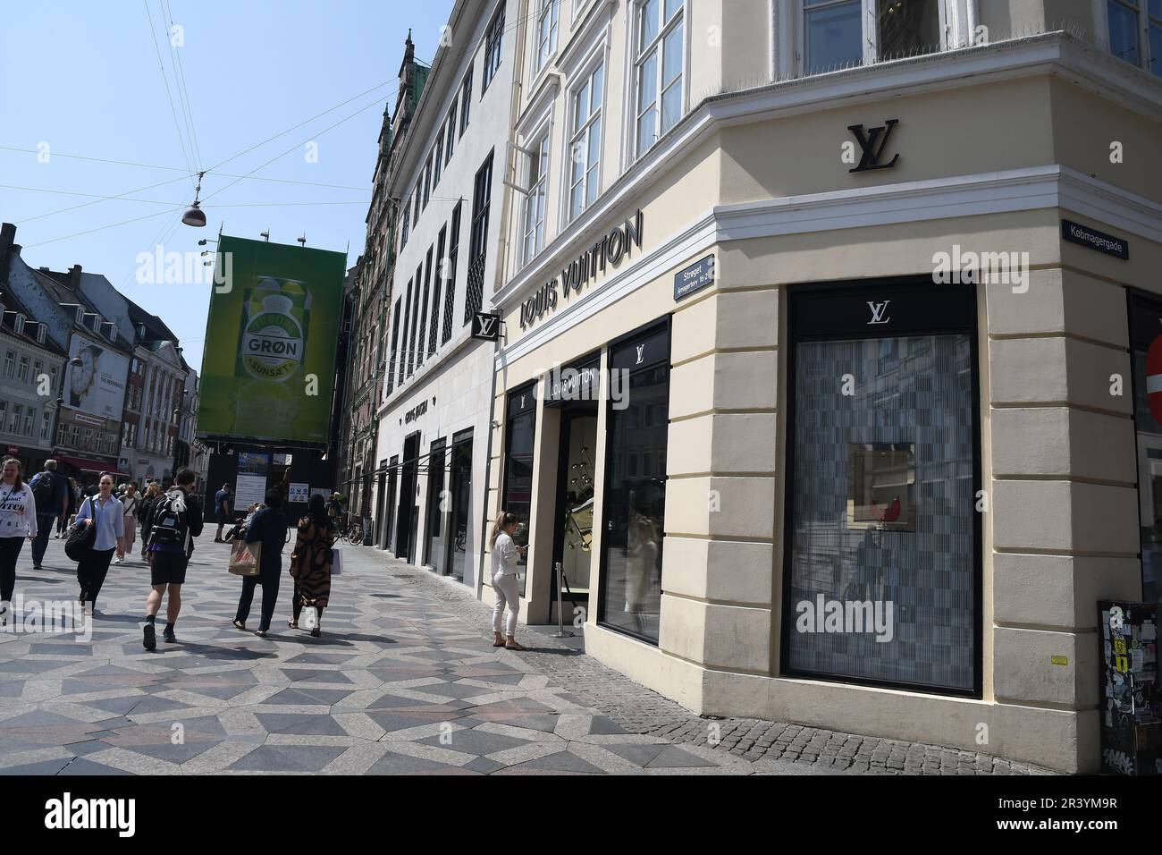 25 May 2023/ Consumers wait at Louis Vuitton store in danish capital ...