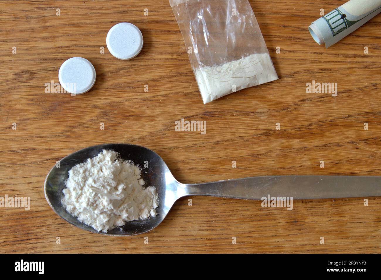 Illegal drugs laid out on a table Stock Photo