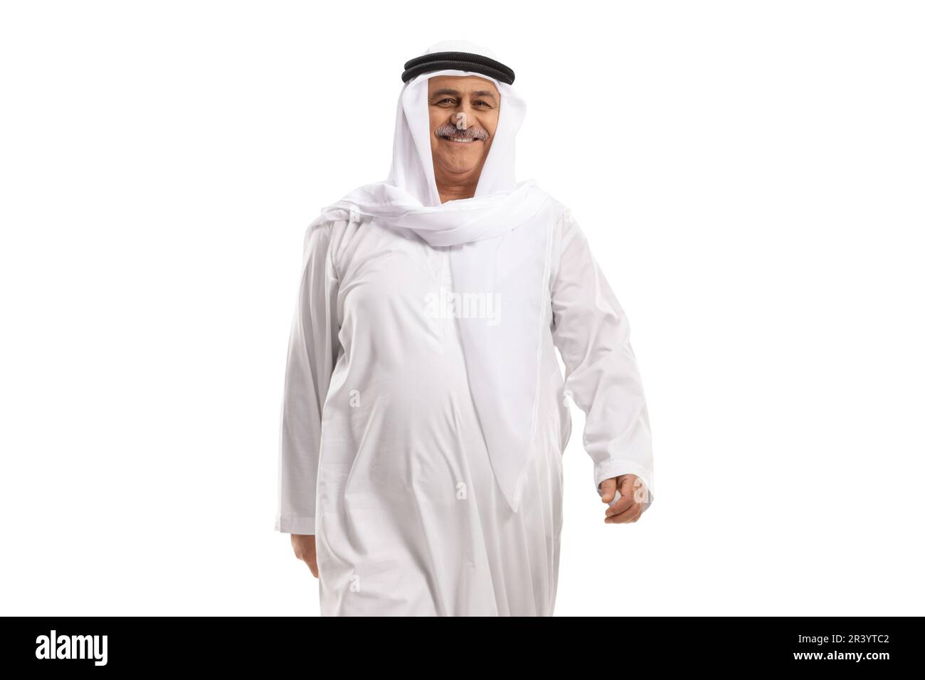 Cheerful mature arab man walking isolated on white background Stock Photo