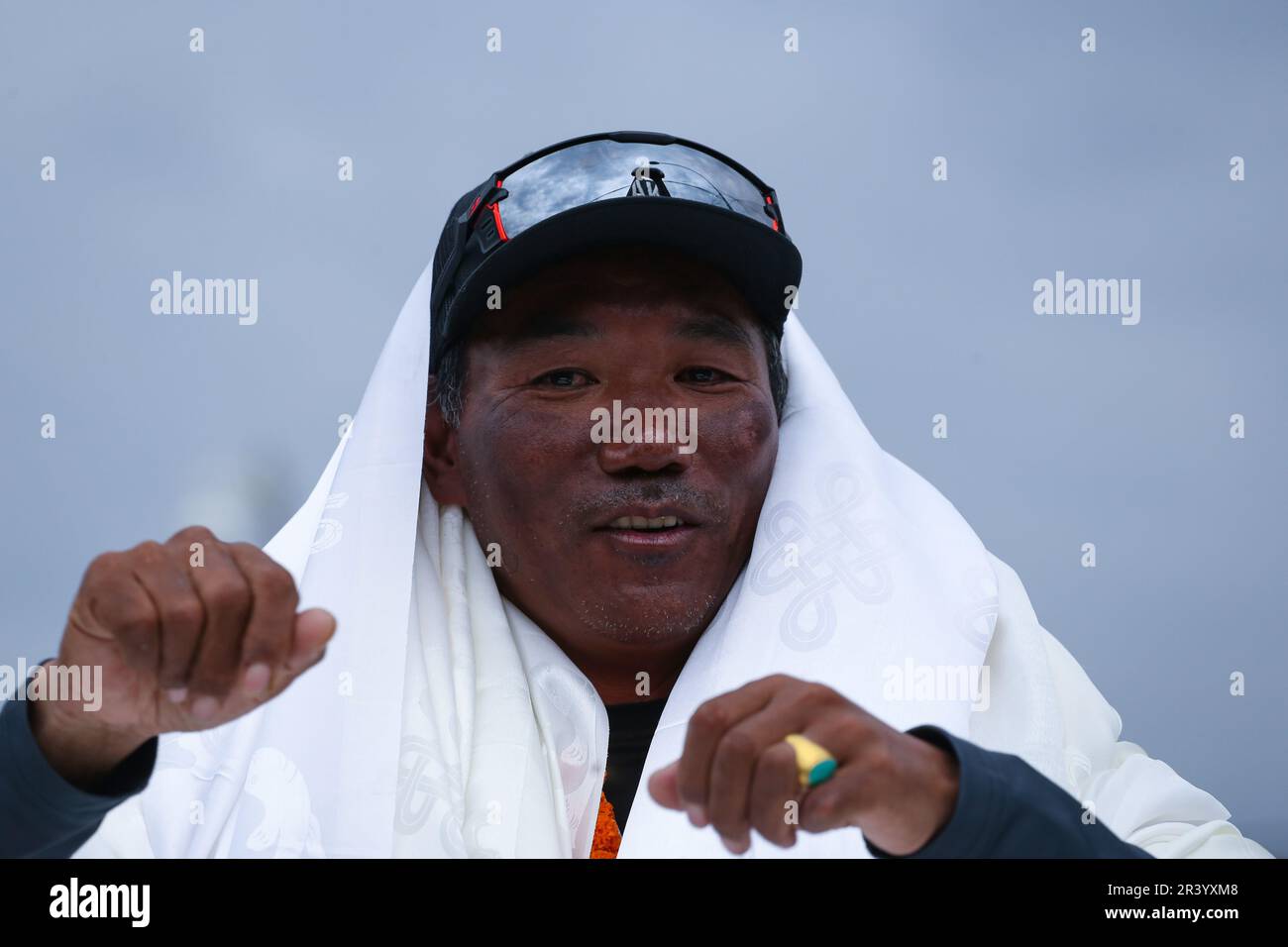 On May 25, 2023, in Kathmandu, Nepal. 'Kami Rita Sherpa' , 53, from Thame, Solukhumbu, a Nepalese veteran mountaineer and a professional mountaineer guide, interract with media personnels while he arrives at the domestic terminal of Tribhuvan International Airport after scaling Everest summit for the 28th time.   Sherpa broke his own record that was set last year. Sherpa’s mountaineering journey began in 1992; meanwhile, sherpa, between 1994 and 2023, has scaled Mt. Everest 28 times, K2 and Lhotse one time each, and Manaslu and Cho Oyu three and eight times, respectively. (Photo by Abhishek Ma Stock Photo