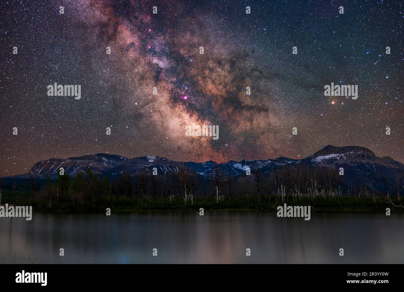 The galactic core region of the Milky Way over Maskinonge Pond in Alberta, Canada. Stock Photo