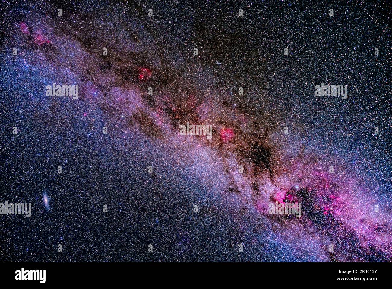 The bright and dark nebulas along the northernmost segment of the Milky Way. Stock Photo