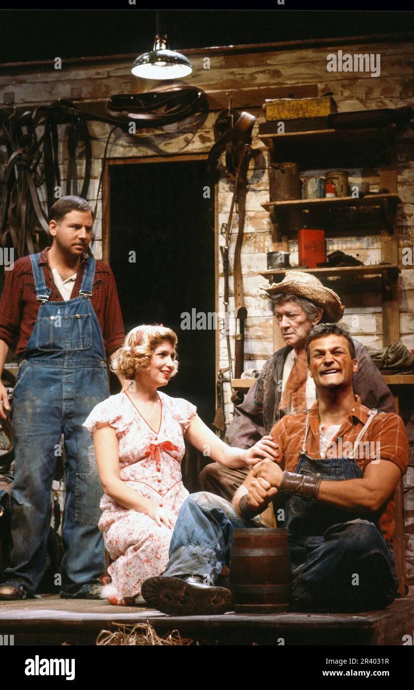 l-r: Lou Hirsch (George), Susan Penhaligon (Curley's Wife), Francis Drake (Candy), Clive Mantle (Lennie) in OF MICE AND MEN by John Steinbeck at the Mermaid Theatre, London EC4  11/1984  set design: Sean Cavanagh  costumes: Sarah-Jane McClelland  lighting: Stanley Osborne-White  fights: Peter Woodward  director: Geoff Bullen Stock Photo