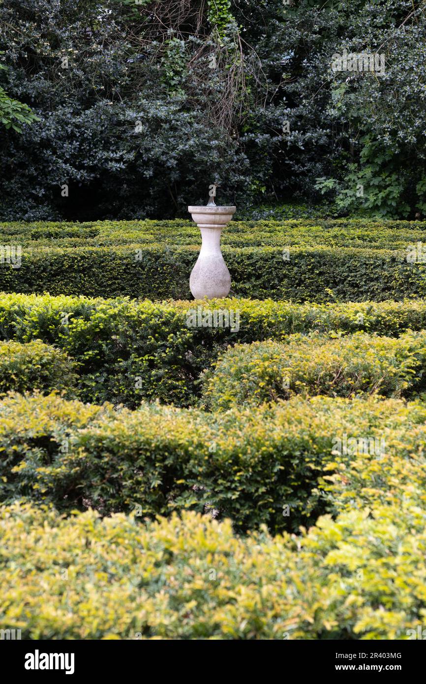 A sundial in the center of the yew maze, at Iveagh Gardens in Dublin, Ireland. Stock Photo