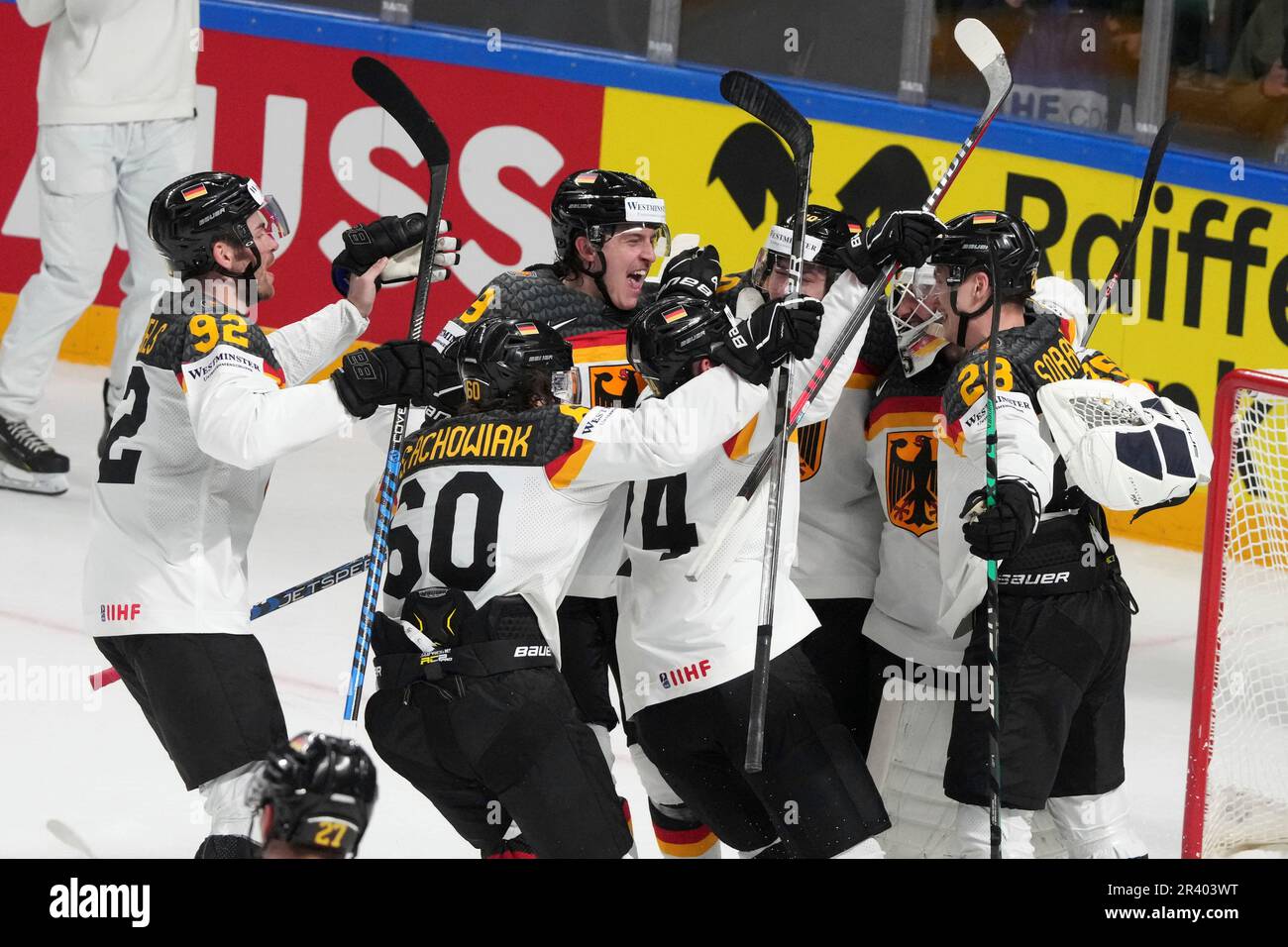 Team Germany players celebrate victory after the quarter final match