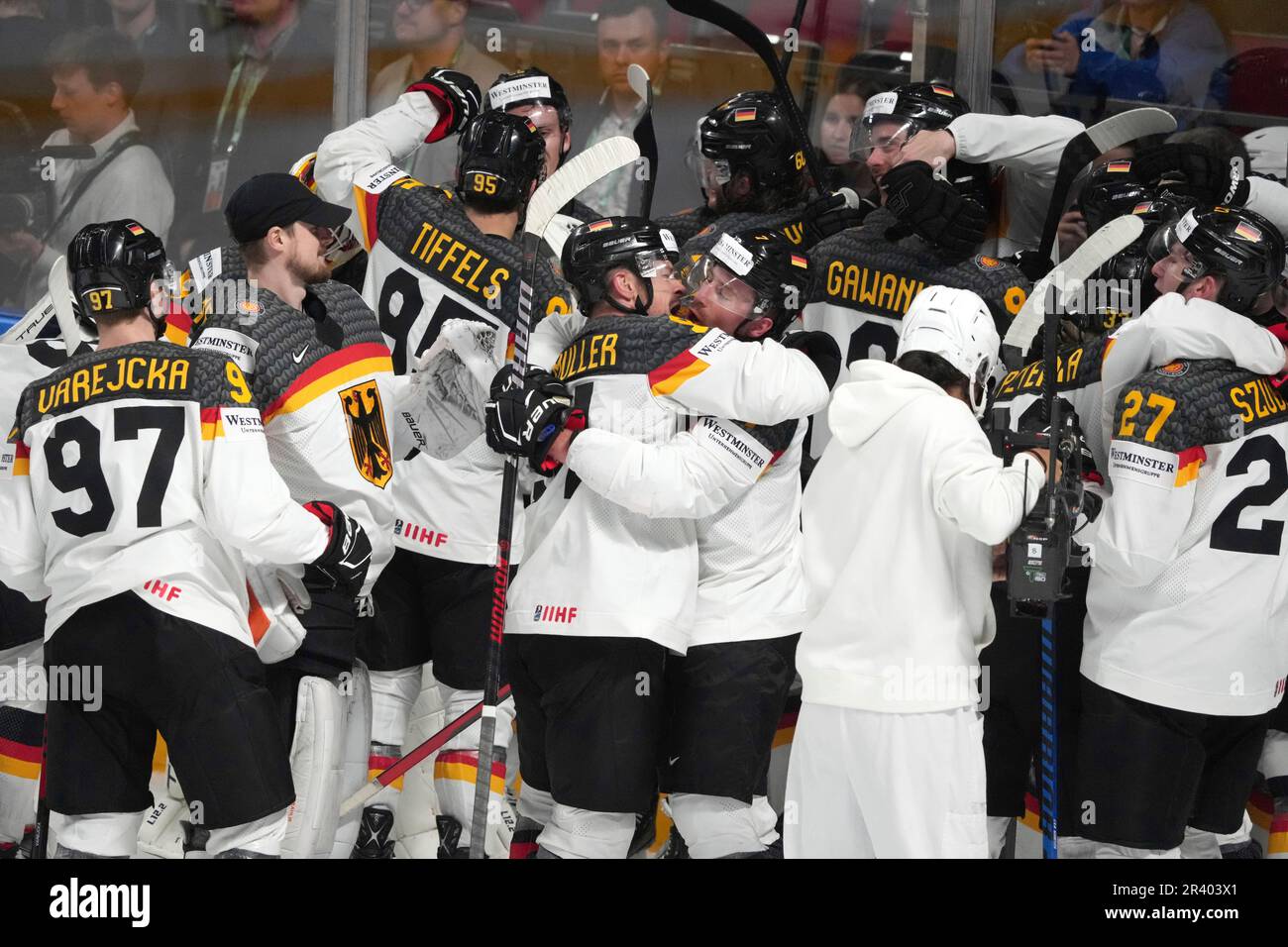 Team Germany players celebrate victory after the quarter final match