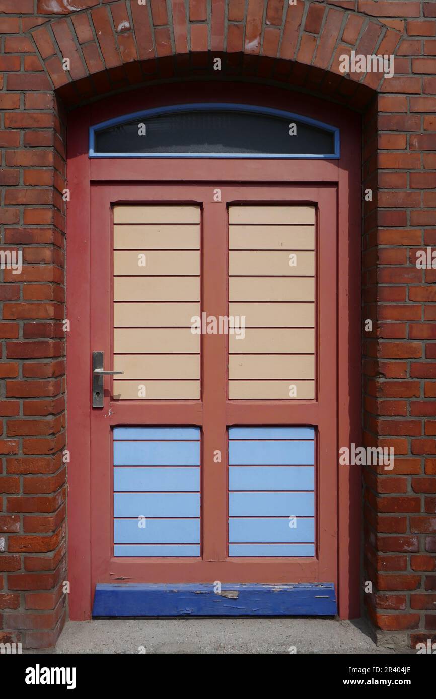 Colorful front door in brick house Stock Photo - Alamy