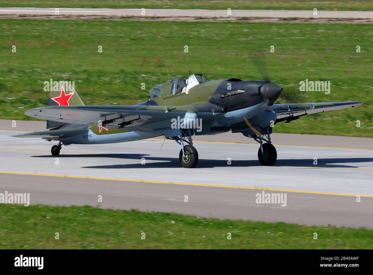 An IL-2M3 attack airplane landing on runway, Zhukovsky, Russia. Stock Photo