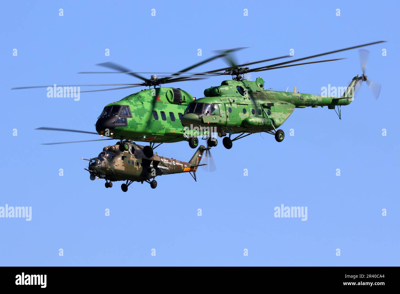 Mil Mi-8AMTSh, Mi-38 and Mi-24P helicopters in flight, Zhukovsky, Russia. Stock Photo