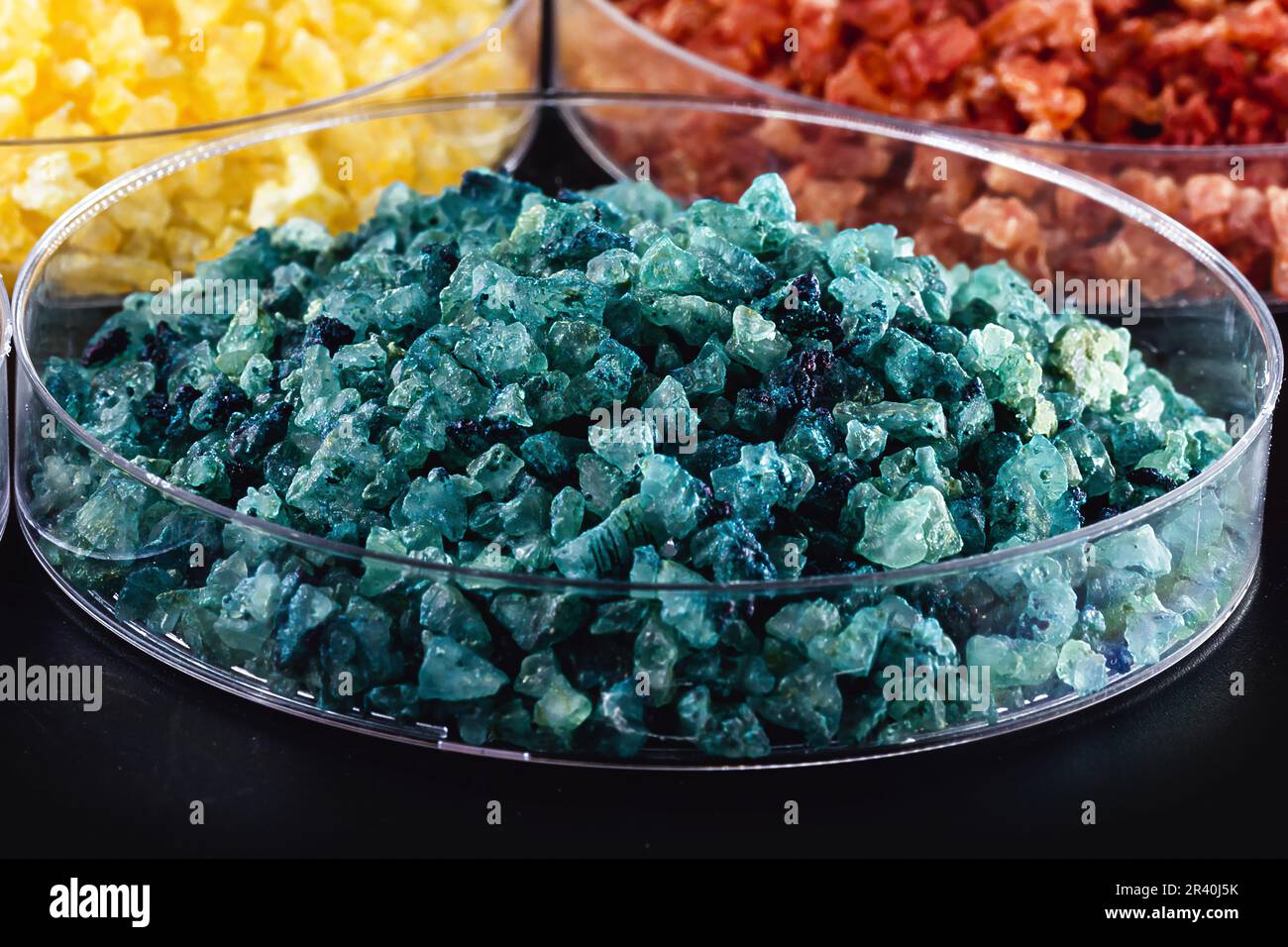 Molten chloride salts, crystals and crystallized rare earth sediments
