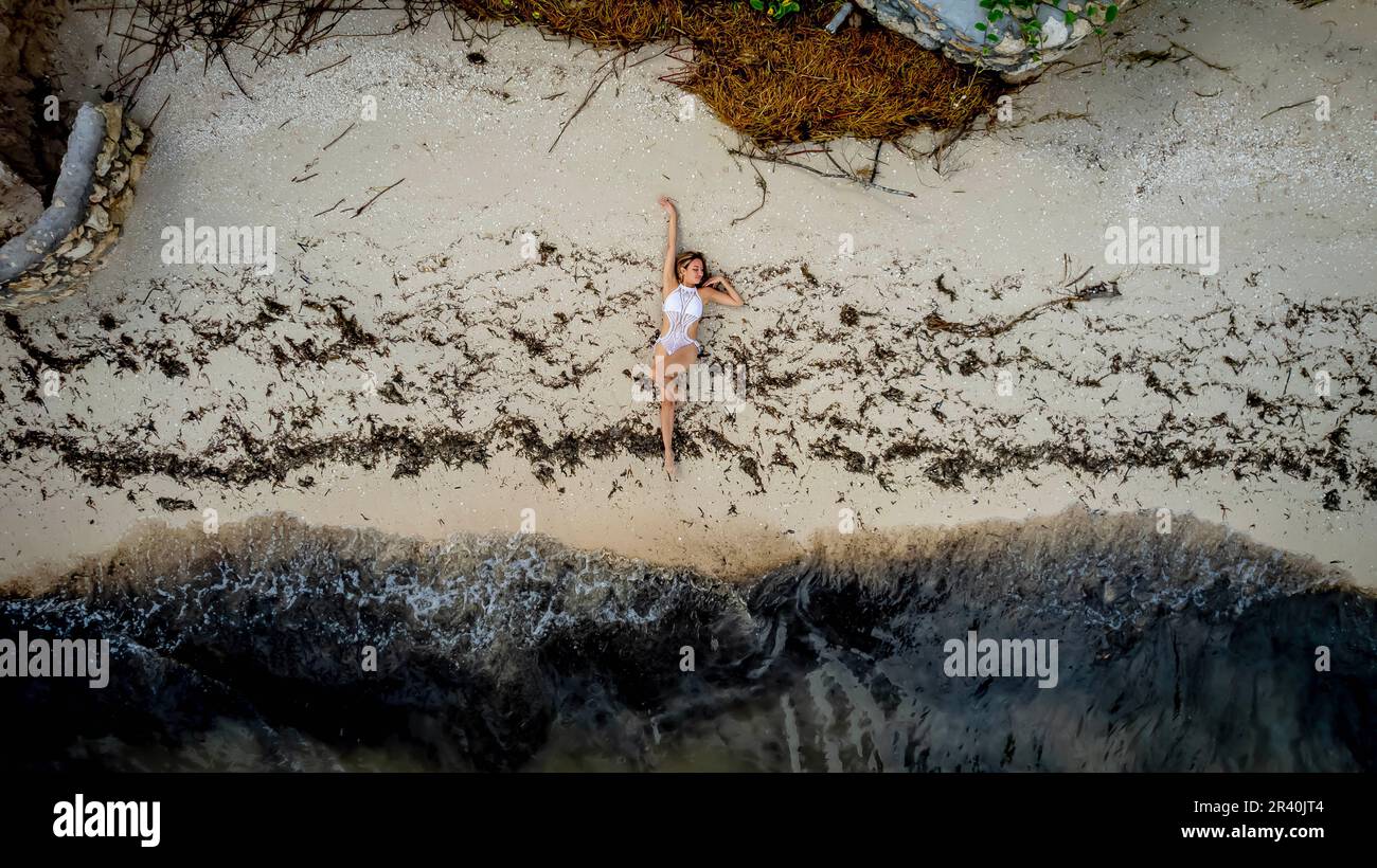 A Lovely Latin Model Enjoys A Day At The Boeach Near The Caribbean Sea Stock Photo