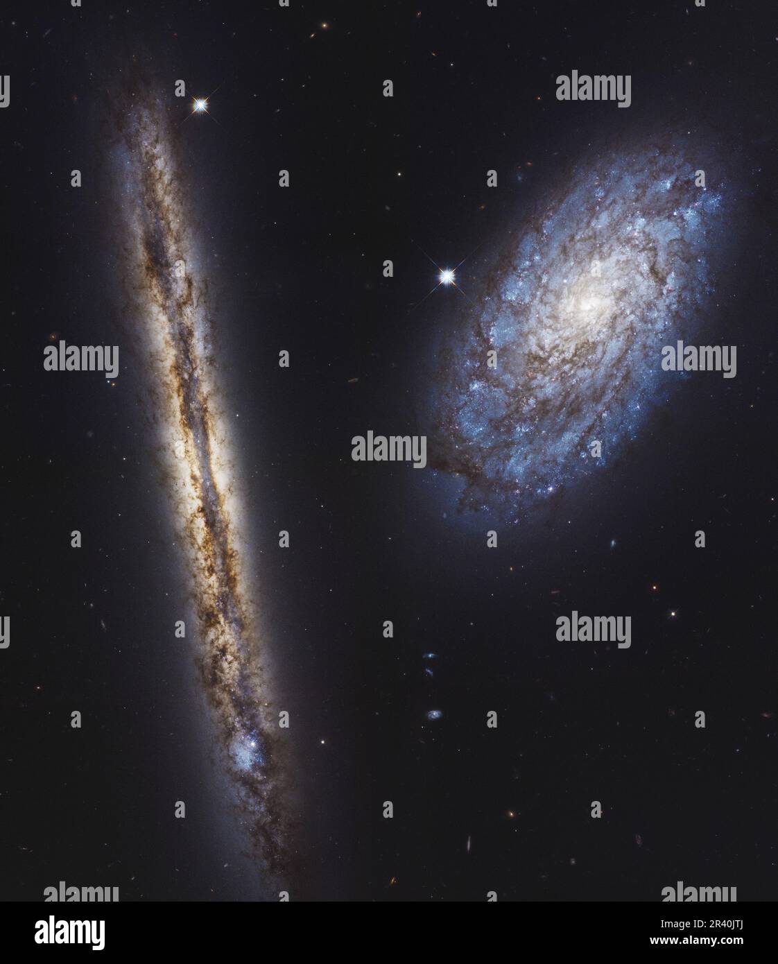 A new angle on edge-on galaxy NGC 4302 (left). and the tilted galaxy NGC 4298 (right). Stock Photo