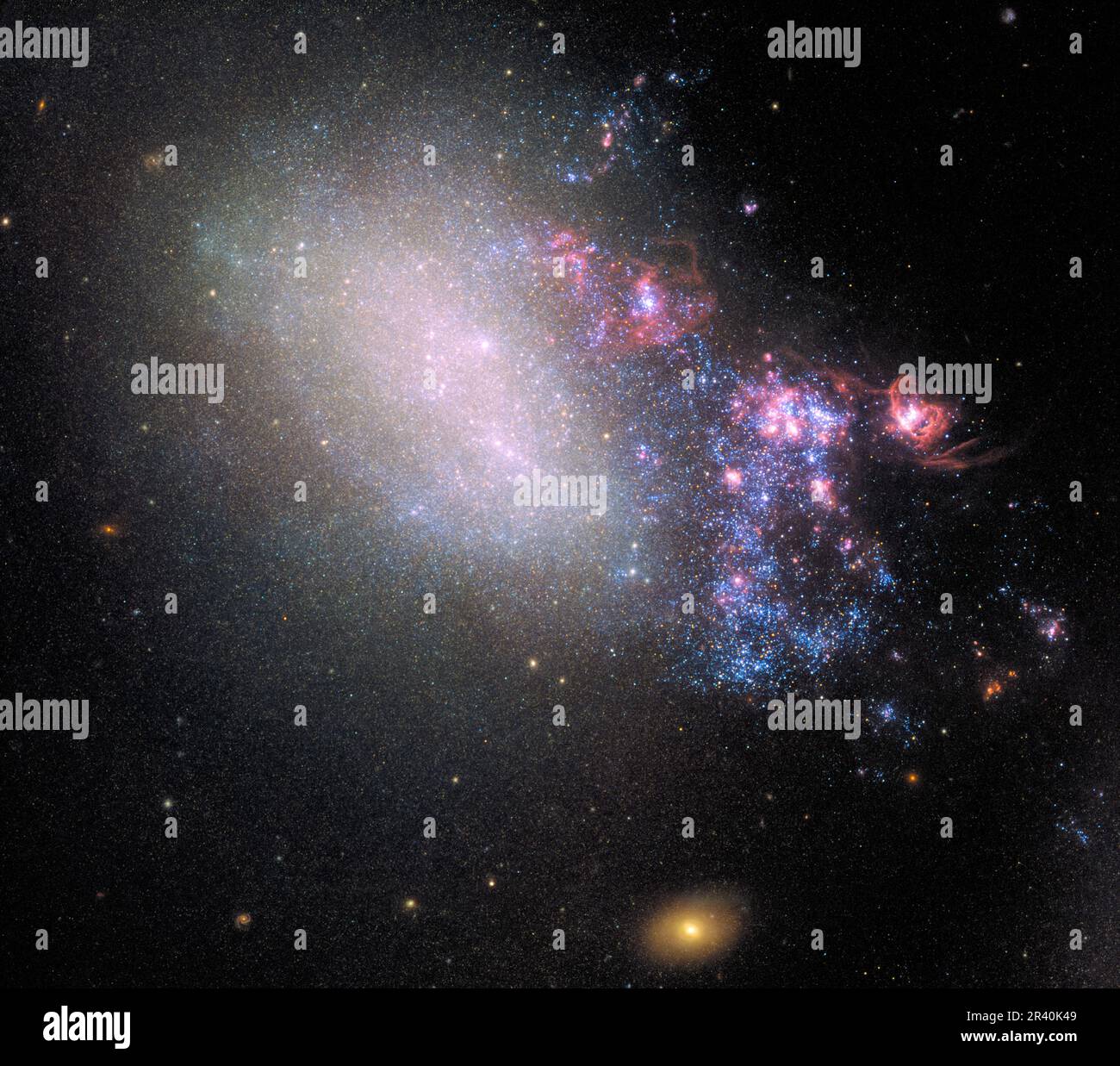 The irregular galaxy NGC 4485, located 25 million light-years away. Stock Photo