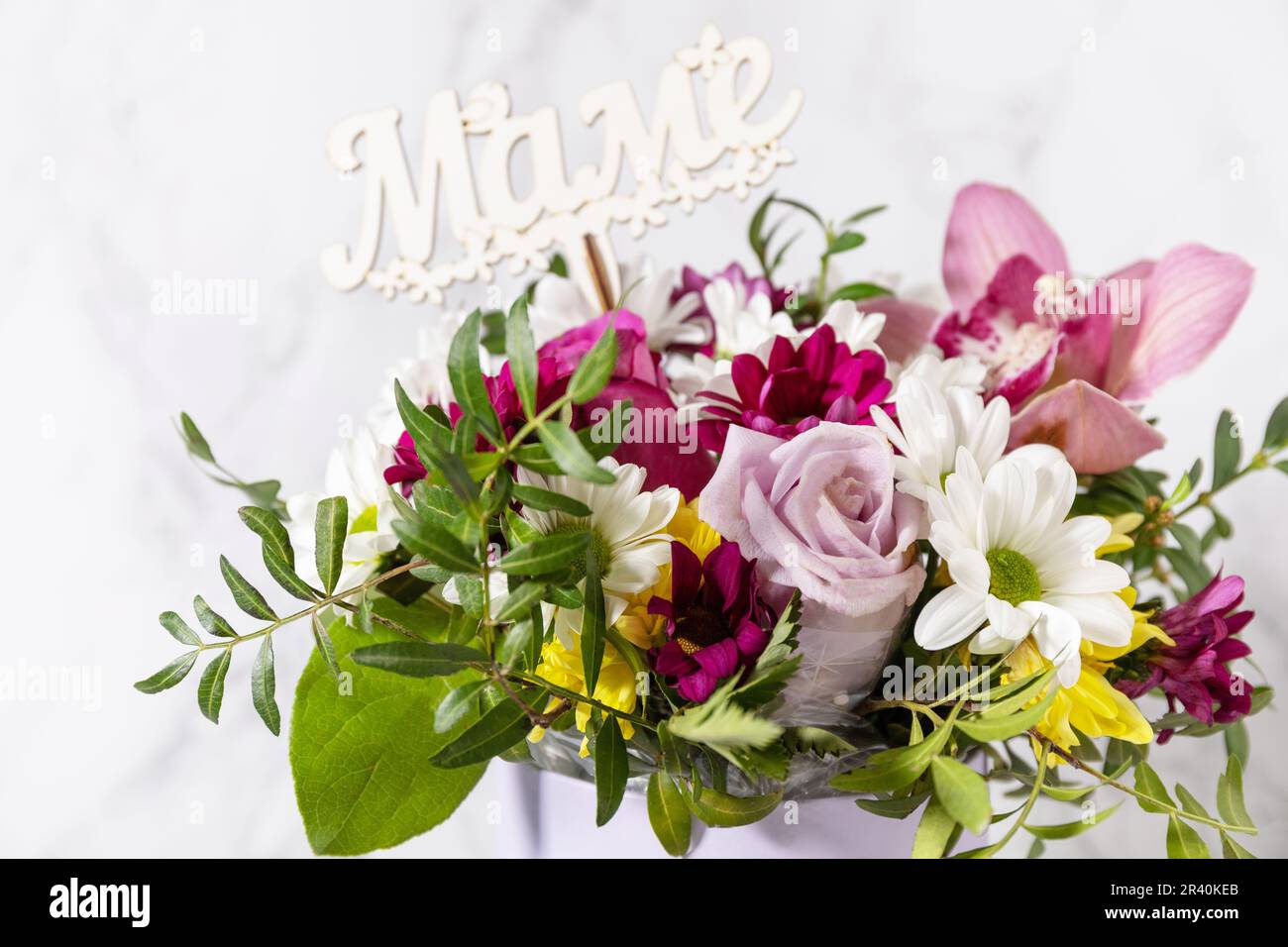 Happy Mothers Day background with dainty flowers. Beautiful greeting card. Holiday concept. Stock Photo