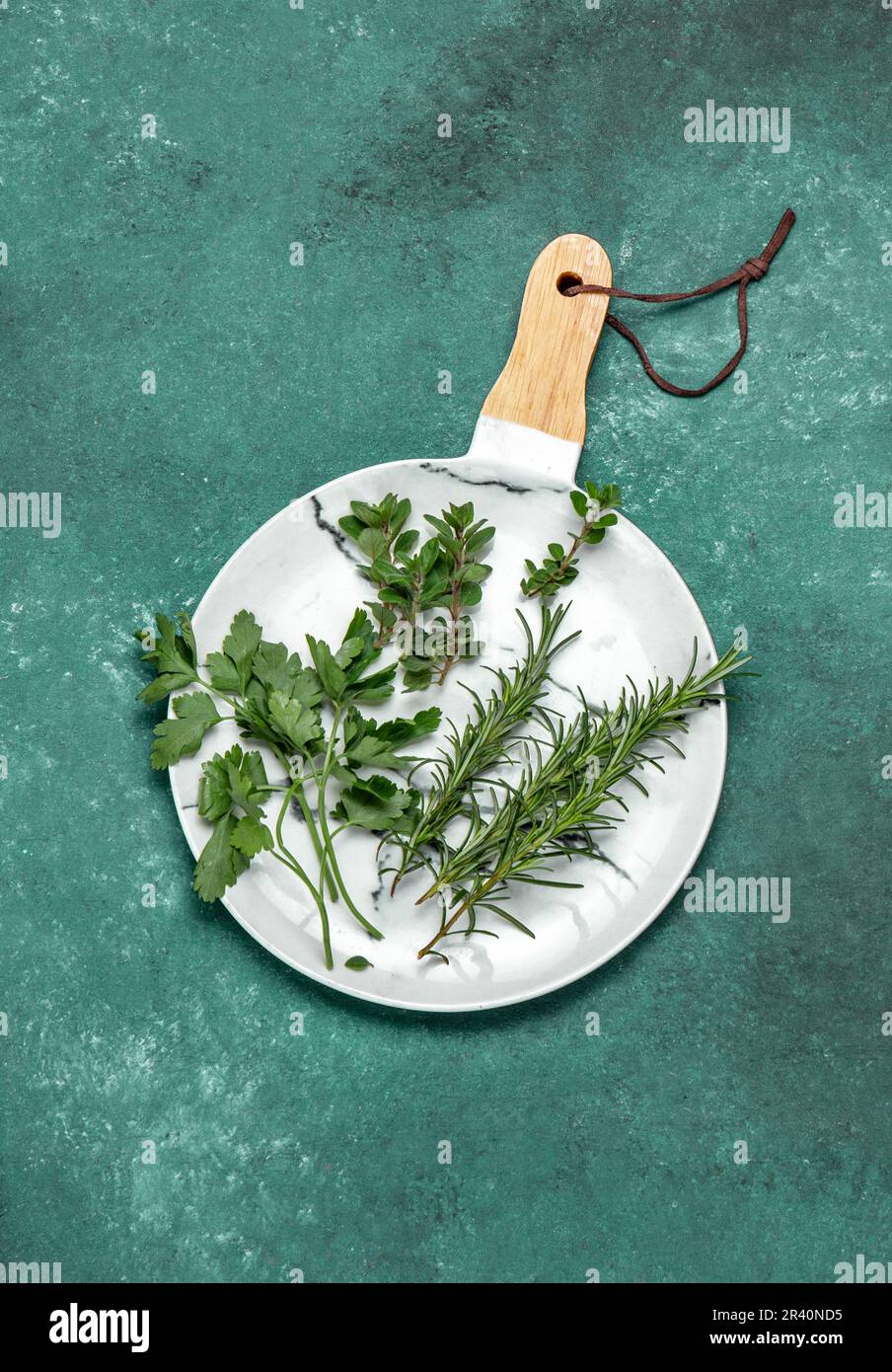 Fresh herbs on white, green background. Top view Stock Photo