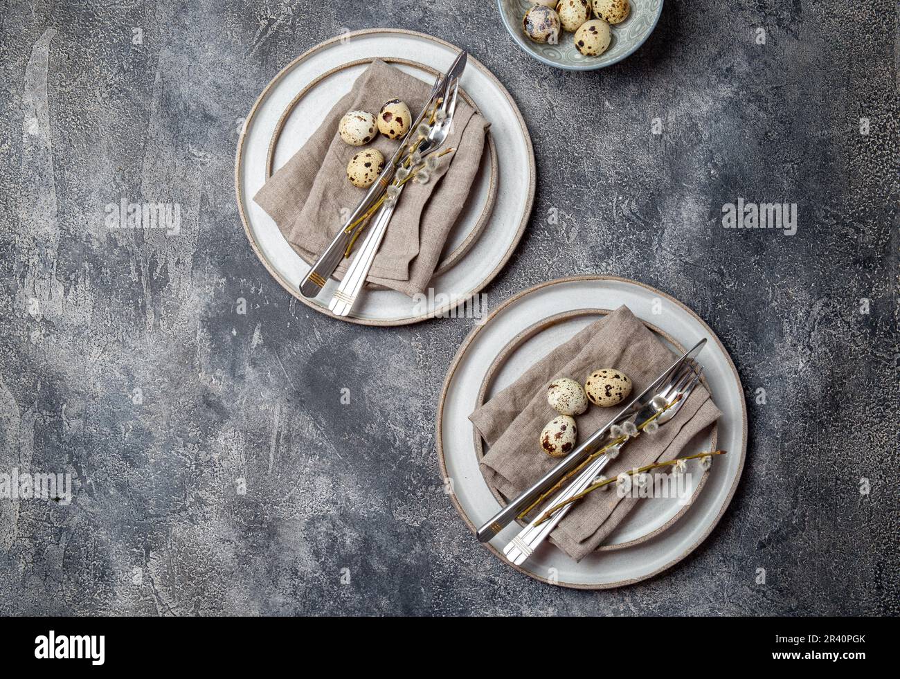 Easter festive table setting with quail eggs. top view Stock Photo