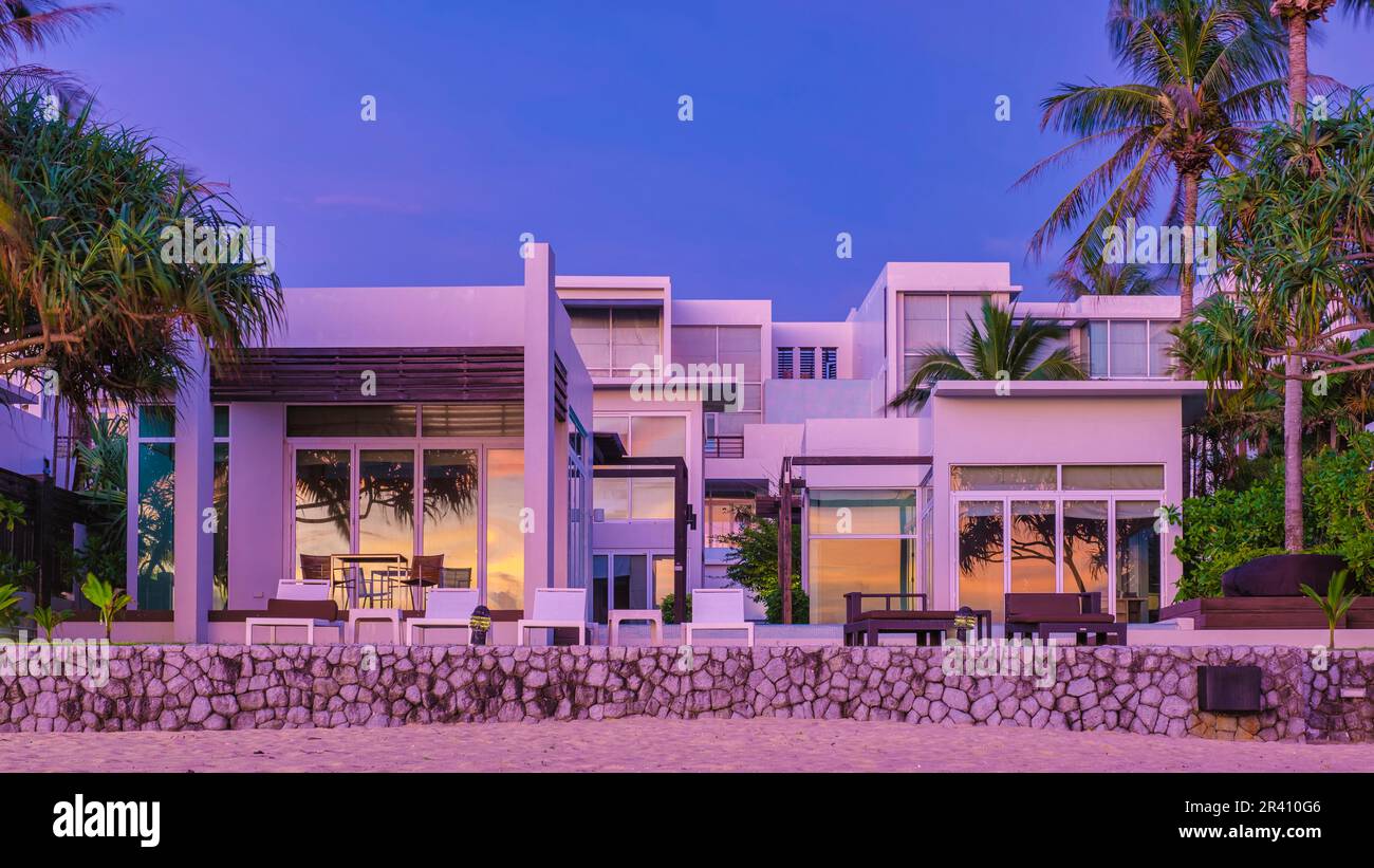 Modern house with a swimming pool, modern pool villa at the beach Stock ...