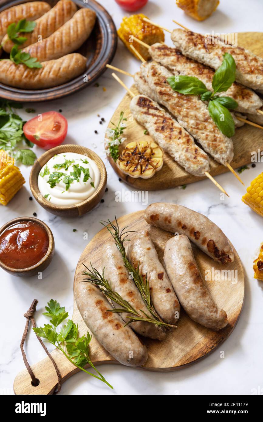 Summer party food. Grill food menu. Various bbq grilled sausages with