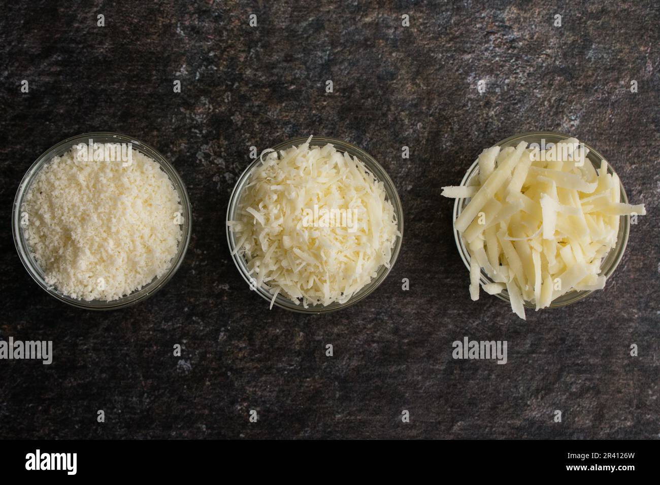 Freshly Grated and Shredded Parmesan Cheese in Glass Prep Bowls Three