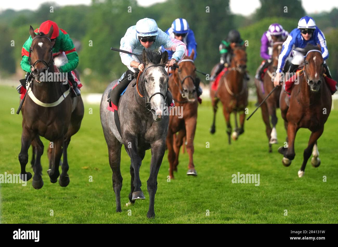 Indemnify ridden by jockey Ray Dawson (second left) wins the Racehorse Lotto Whitsun Cup Handicap during Brigadier Gerard Evening at Sandown Park Racecourse, Surrey. Picture date: Thursday May 25, 2023. Stock Photo