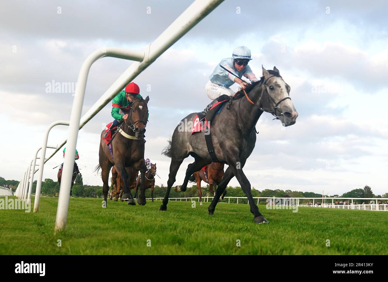 Indemnify ridden by jockey Ray Dawson (right) on their way to winning the Racehorse Lotto Whitsun Cup Handicap during Brigadier Gerard Evening at Sandown Park Racecourse, Surrey. Picture date: Thursday May 25, 2023. Stock Photo