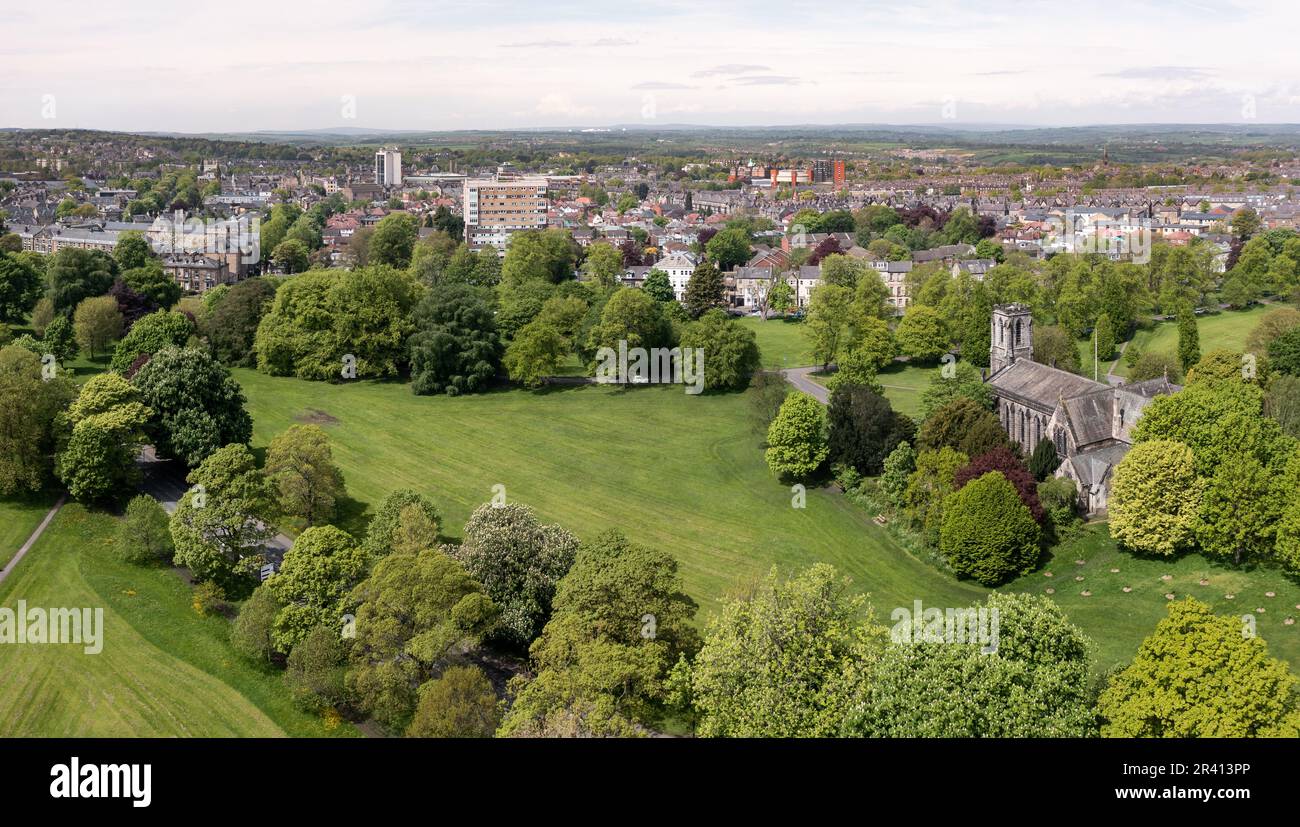 An aerial cityscape of Harrogate town with The Stray public park and local church Stock Photo