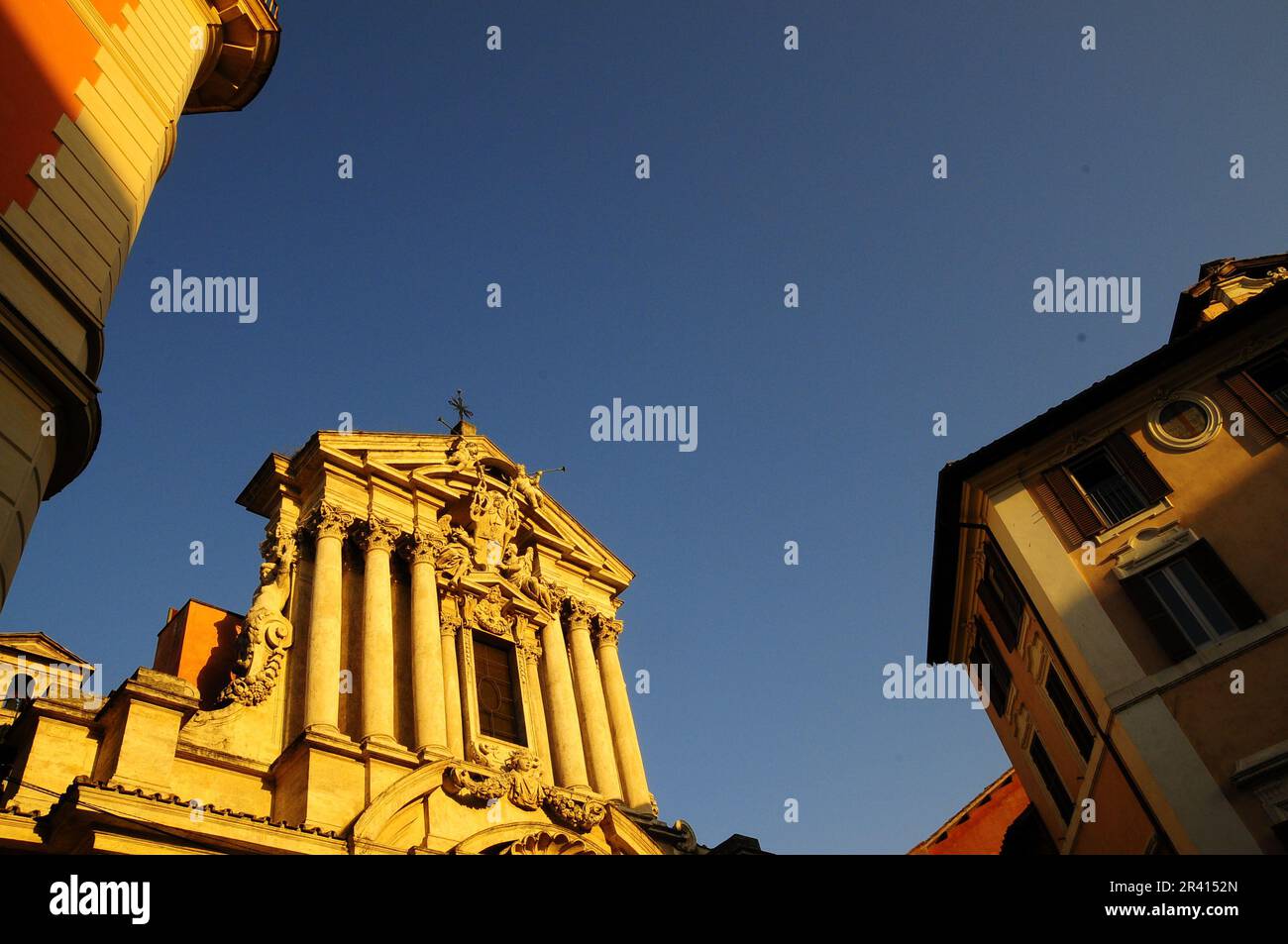 Low angel view of old building with sculptures in Rome Italy Stock Photo